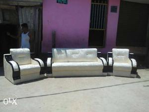 White And Black Cushioned Couch With Armchairs