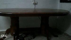 Wooden dining table for just Rs /- no chairs available.