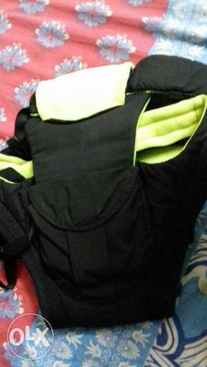 Black And Green Baby Carrier