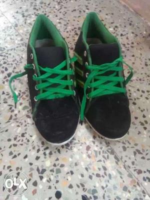 Black-and-green Adidas Low Top Shoes