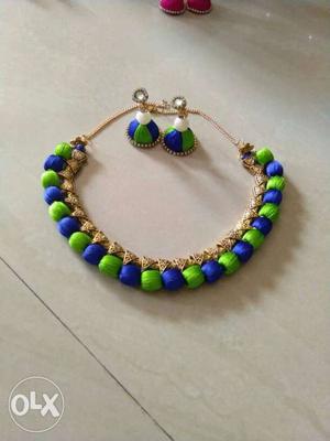 Green-and-blue Satin Bib Necklace And Jhumka Earrrings Set