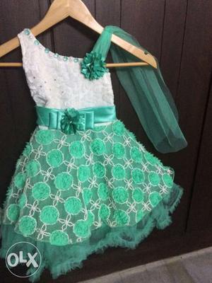 New Green Cinderella baby dress for a 3-4 year girl.