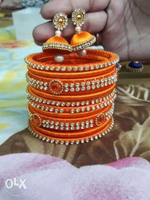 Orange Jhumka Earrings And Bracelet Set