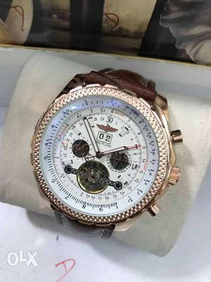 White And Black Chronograph Watch With Brown Leather Strap
