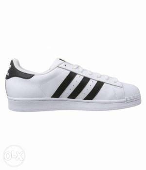 White and black casual shoes, few pics left