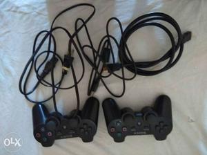 PS3 with two new original controllers.