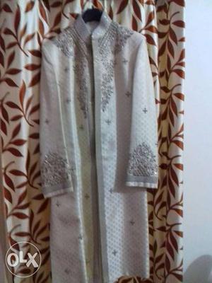 6 months old sherwani in good condition and zari