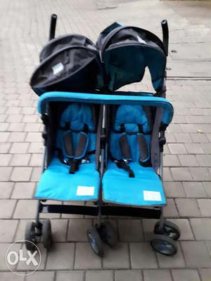BRAND New Twin Pram with net (negotiable)