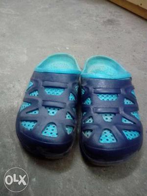 Blue crocs in perfect condition size 7. Not at all torn