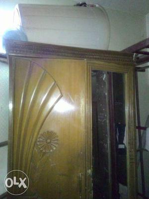 Brown Wooden Double Door Cabinet With Mirror