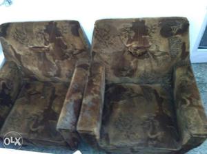 Five Brown Floral Sofa Chairs