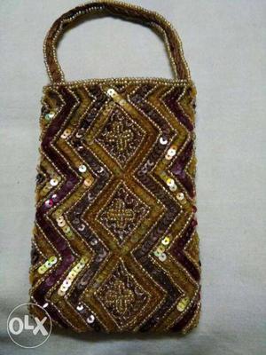 Gold And Maroon Hand Bag