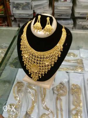 Gold Collar Necklace And Pair Of Gold Earrings
