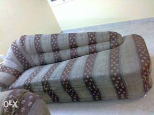 Gray And Maroon Cushioned Chaise Lounge
