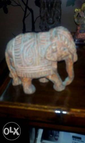 Gray, Brown, And Green Elephant Figurine