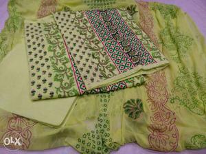 Green, Brown, And Black Floral Textiles