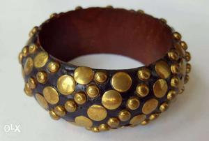 Jewellery: Gold Polka Embossed Texture On Wooden