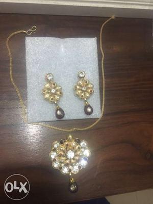 One chain, pendant, earrings
