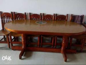 Oval Brown Wooden Table And Chairs Set