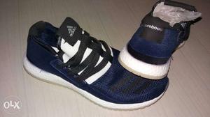 Pair Of Blue-white-and-black adidas Pureboost