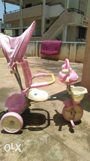 Pink And White Tricycle