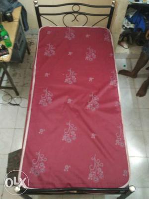 Single bed with Red Mattress