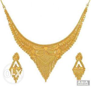 Three Gold Necklace And Earrings