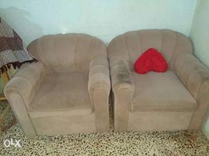 Two Beige Fabric Sofa Chairs