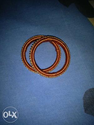 Two Orange Silk Thread Bangles