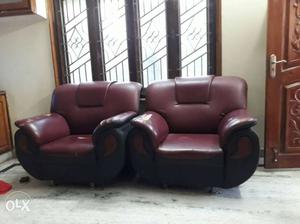 Two Red Leather Armchairs