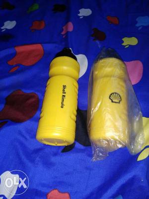 Two Yellow Plastic Tumblers