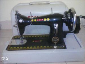Usha sewing machine in excellent new condition.