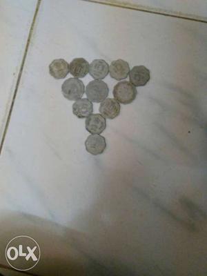 12 silver 10p coins