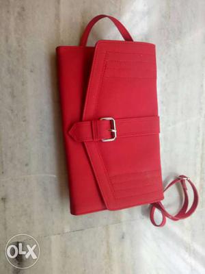 New cheery red sling bag