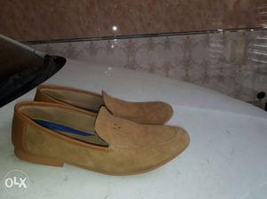 Pair Of Brown Suede Loafers