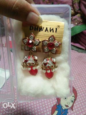 Pair Of Embellished Rhinestone Red Jhumka Earrings