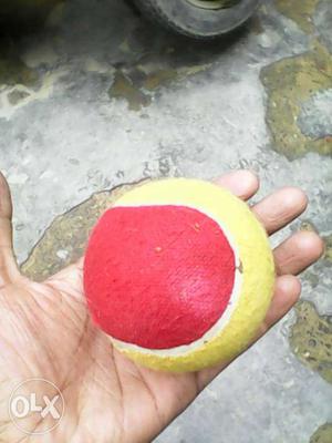 Red And Yellow Tennis Ball