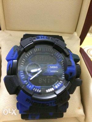 Round Black And Blue Casio G-shock Digital Watch