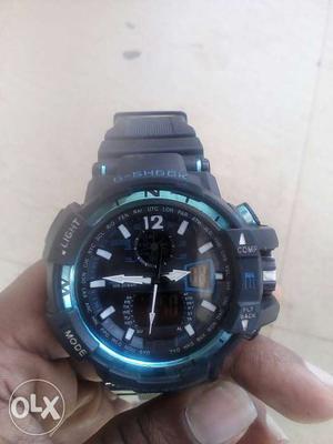 Round Black Chronograph Watch With Rubber Strap
