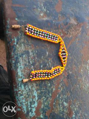 Yellow And Green Beaded Accessory