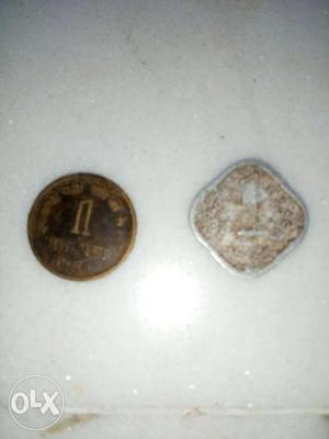 ₹/- for aluminum coin & /- for Copper