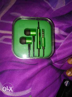 Green And Black Earbuds