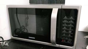 Silver And Black Samsung Microwave Oven