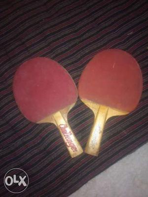 Two Red-and-brown Ping Pong Paddles not used so want to sell