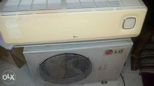 White LG Split Type AC Unit And Condenser Unit