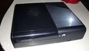 Xbox 360 e 250 gb.. with a new genuine controller