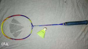 Yellow, Red And Blue Badmenton Racket And Shuttle Cosk