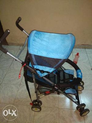Blue And Black Lightweight Stroller At only 