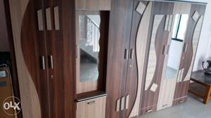 Brown Wooden Cabinet With Two Mirrors