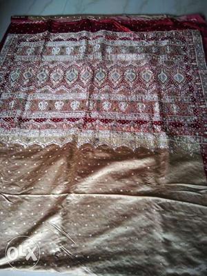 Heavy jardosi work bridal sari.